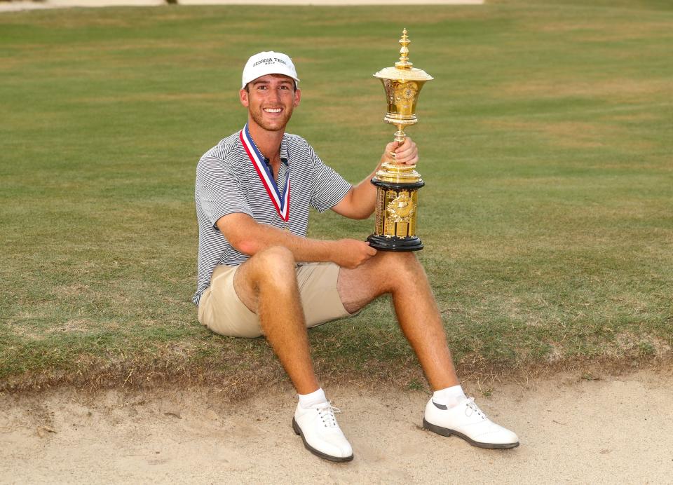 Andy Ogletree holds the Havemeyer Trophy after winning the final of the 2019 U.S. Amateur Championship, 2 and 1, over John Augenstein at Pinehurst Resort.