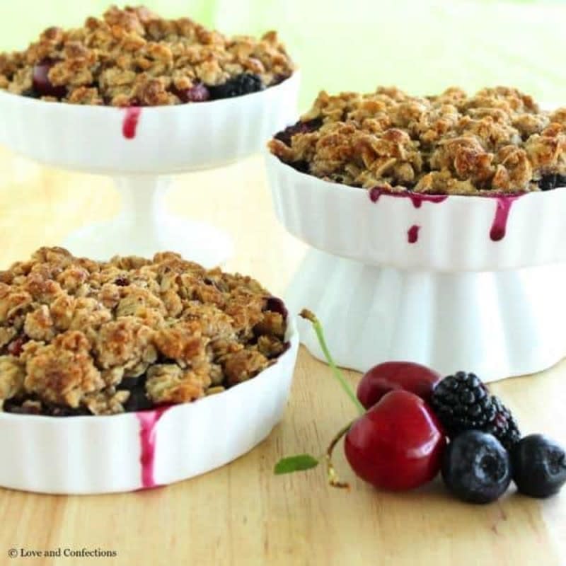 <p>Cupcakes & Kale Chips</p><p>Farmer’s market fresh fruits combine with a crunchy almond and oat crumb topping to make an easy summer dessert.</p><p><strong>Get the recipe: <a href="https://cupcakesandkalechips.com/gluten-free-blackberry-blueberry-and-cherry-crisp/" rel="nofollow noopener" target="_blank" data-ylk="slk:Blackberry, Blueberry and Cherry Crisp;elm:context_link;itc:0;sec:content-canvas" class="link ">Blackberry, Blueberry and Cherry Crisp</a></strong></p>