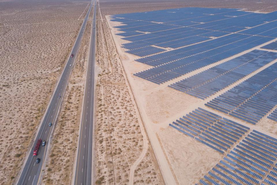 <div class="inline-image__title">1233529683</div> <div class="inline-image__caption"><p>Vehicles driving on the California 14 Highway as solar panels, part of an electricity generation plant, stand on June 18, 2021 in Kern County near Mojave, California. The California ISO extended a Flex Alert asking customers to conserve electricity amid concerns of power outages during the heat wave. </p></div> <div class="inline-image__credit">Patrick T. Fallon/Getty</div>