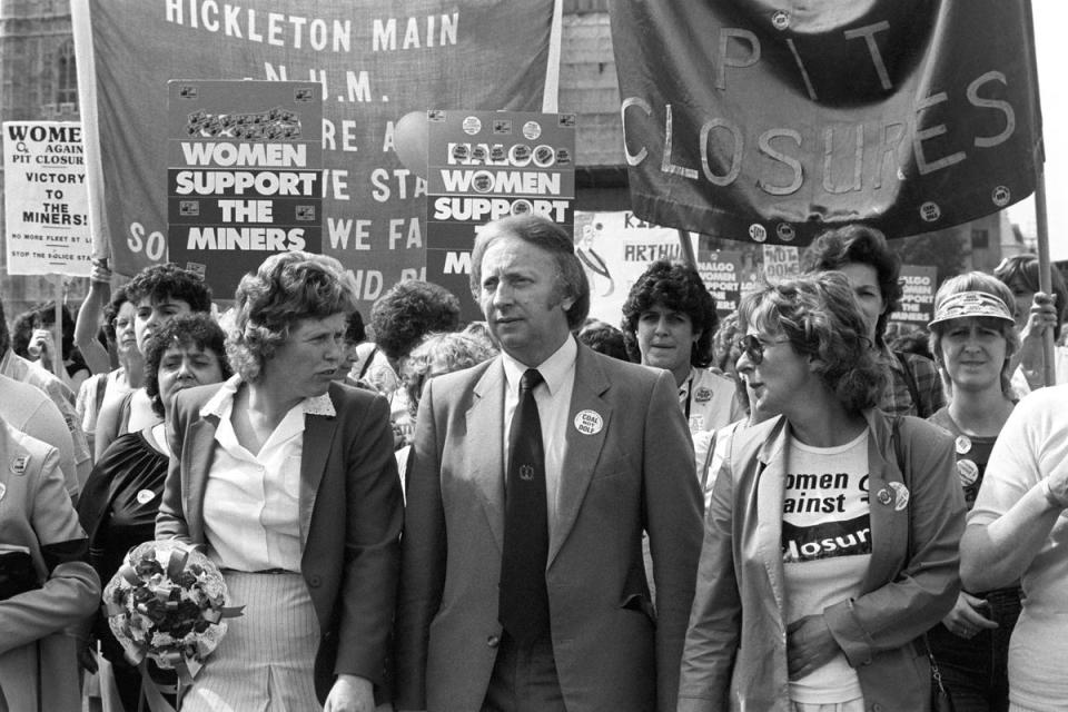 Arthur Scargill and a group of Welsh miners' wives cross Westminster Bridge during the 1984 miners' strike (PA Archive)