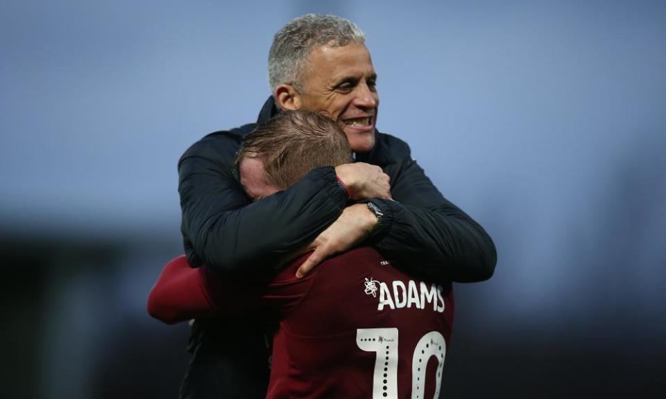 Keith Curle and Nicky Adams celebrate Northampton’s third-round win at Derby.