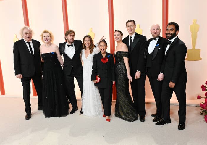 Director Ruben Östlund, third from left, with the cast of Triangle of Sadness at the Oscars on Sunday. 