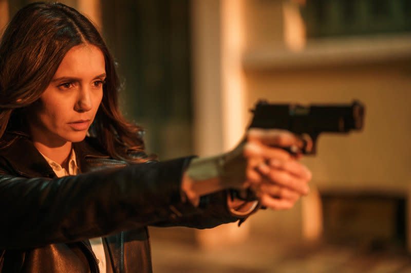 Nina Dobrev gets in on the action in "The Bricklayer." Photo courtesy of Vertical