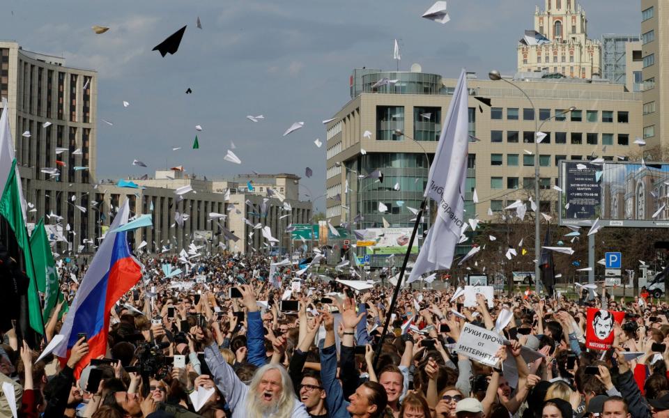 In Moscow, people release paper planes, a symbol of the Telegram messenger, during a rally in protest against court decision to block the messenger because it violated Russian regulations in 2018 - TATYANA MAKEYEVA/Reuters