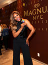 <p>Somebody’s sweet on ice cream! The <i>Orange Is the New Black</i> actress and advocate helped GLAAD and Magnum celebrate LGBTQ pride month with a special Pride Magnum bar at the ice cream maker’s New York City shop. (Photo: Amy Sussman/Invision for MAGNUM/AP Images) </p>