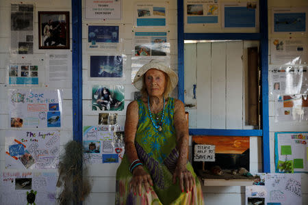 June Haimoff, known as Captain June, poses for a photo in her hut at Iztuzu Beach near Dalyan in Mugla province, Turkey, August 1, 2018. "When I first saw a sea turtle laying eggs, I watched without moving. I remember tears in my eyes," Haimoff said. "From that day I started to collect any kind of information about them that I could." REUTERS/Umit Bektas