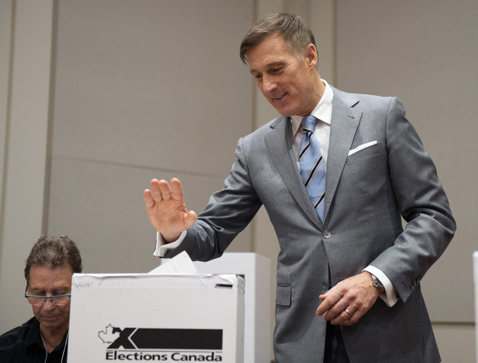 People's Party of Canada Leader Maxime Bernier casts his ballot in Saint-Georges, Quebec, Monday, Oct. 21, 2019. (Jacques Boissinot/The Canadian Press via AP)