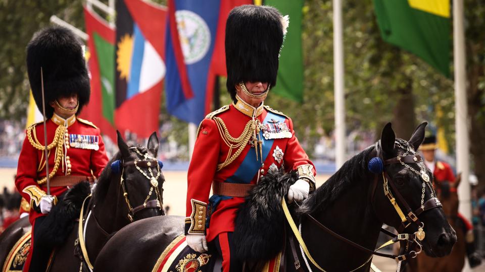 Britain's King Charles III (R) and Britain's Prince Edward, Duke of Edinburgh (L) ride back to Buckingham Palace after the King's Birthday Parade, 'Trooping the Colour', in London on June 17, 2023. The ceremony of Trooping the Colour is believed to have first been performed during the reign of King Charles II. Since 1748, the Trooping of the Colour has marked the official birthday of the British Sovereign. Over 1500 parading soldiers and almost 300 horses take part in the event. (Photo by HENRY NICHOLLS / AFP) (Photo by HENRY NICHOLLS/AFP via Getty Images)