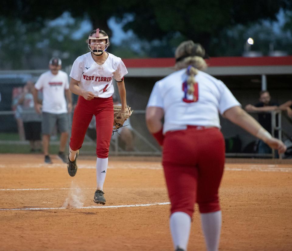Sydney Scapin (2) celebrates getting another strikeout to end the top of the 8th inning during the Bishop Kenny vs West Florida 4A regional quarterfinals softball game at West Florida High School in Pensacola on Wednesday, May 11, 2022.  The Jaguars defeated the Crusaders 4-3 in 17 innings.