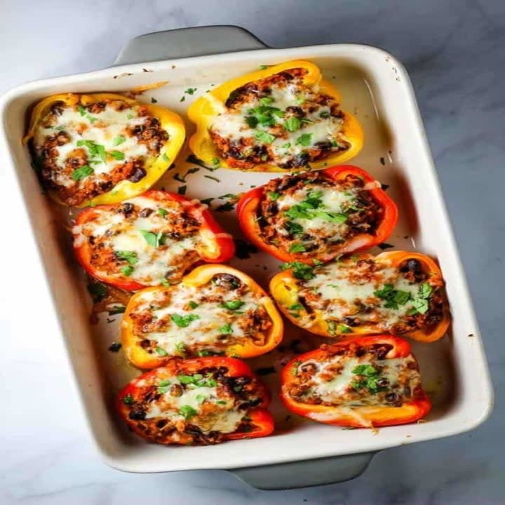 A baking dish with Mexican stuffed peppers