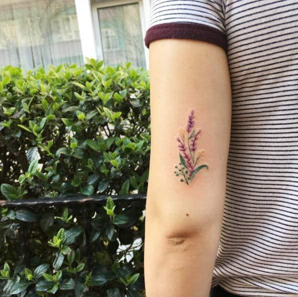 We love the placement and the colours of this arm tattoo. 