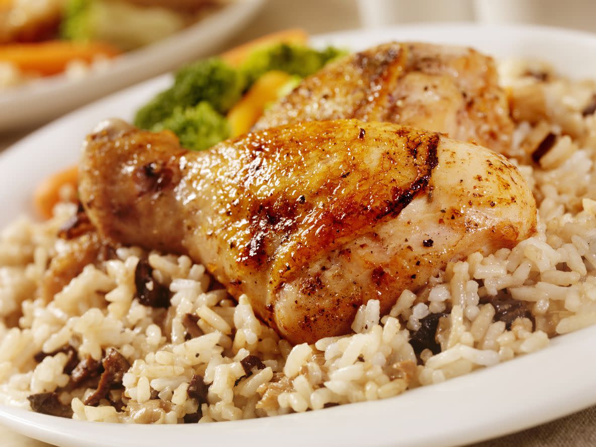 Chicken and rice casserole served on a white plate