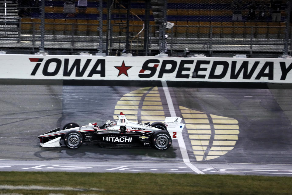 Josef Newgarden celebrates as he wins the IndyCar Series auto race Sunday, July 21, 2019, at Iowa Speedway in Newton, Iowa. (AP Photo/Charlie Neibergall)