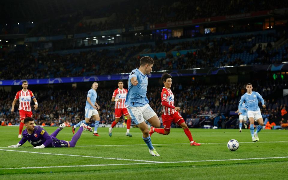 Manchester City's Julian Alvarez scores their first goal