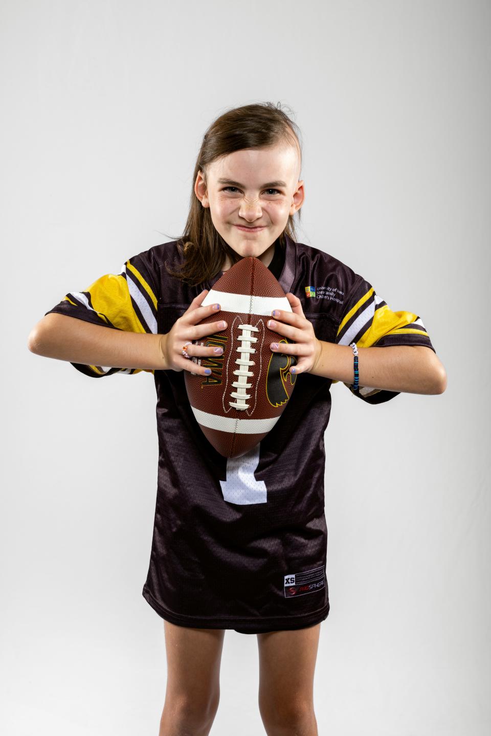 Gracelyn Springer poses for a photo on July 10, 2023. Springer will be the Kid Captain for Iowa's season-opener against Utah State on Sept. 2.