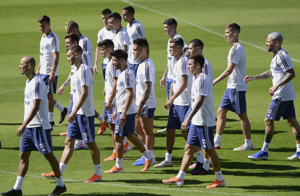 Argentina's national soccer team warms up during a practice session in Belo Horizonte, Brazil, Tuesday, June 18, 2019. Argentina will face Paraguay tomorrow in a Copa America Group B soccer match. (AP Photo/Eugenio Savio)