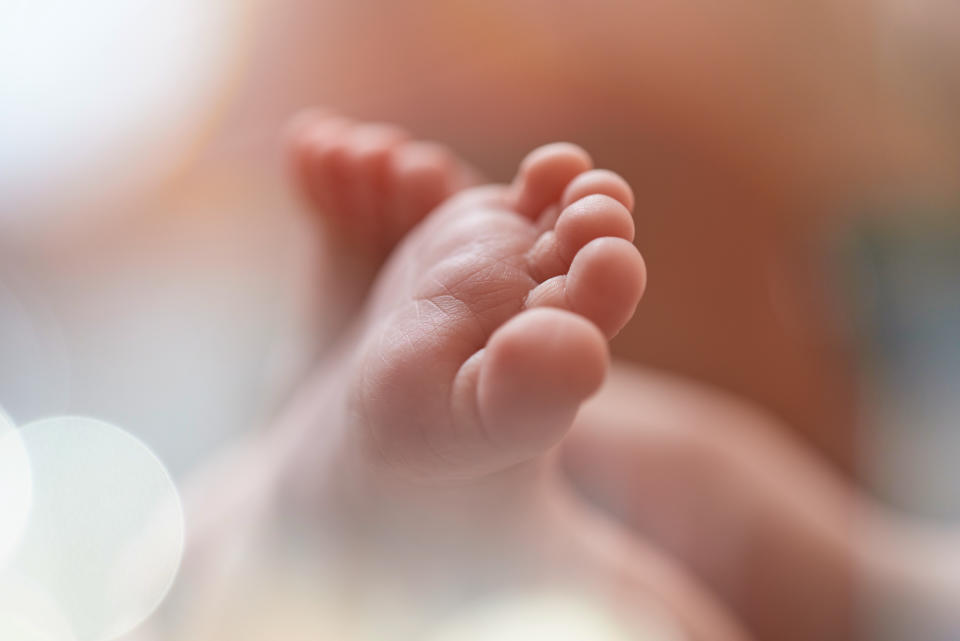 The babies mother gave birth in secret while babysitting. (Getty)