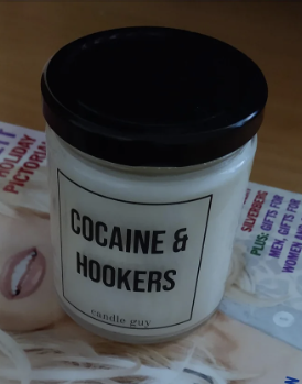 candle labeled cocaine and hookers