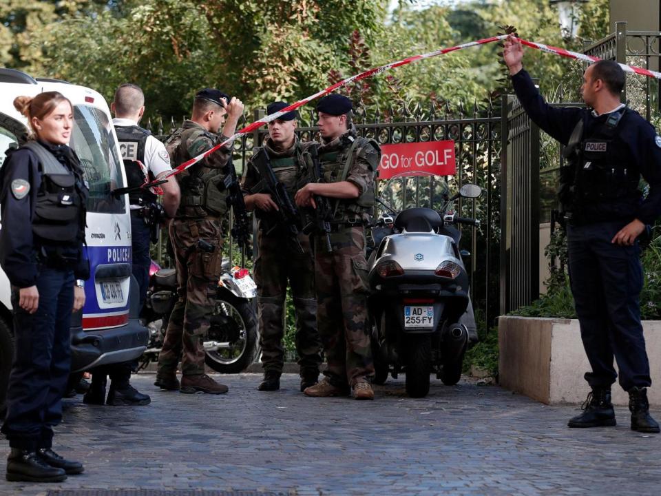 Police and soldiers secure the scene where French soliders were hit and injured by a vehicle in the western Paris suburb of Levallois-Perret (REUTERS/Benoit Tessier)