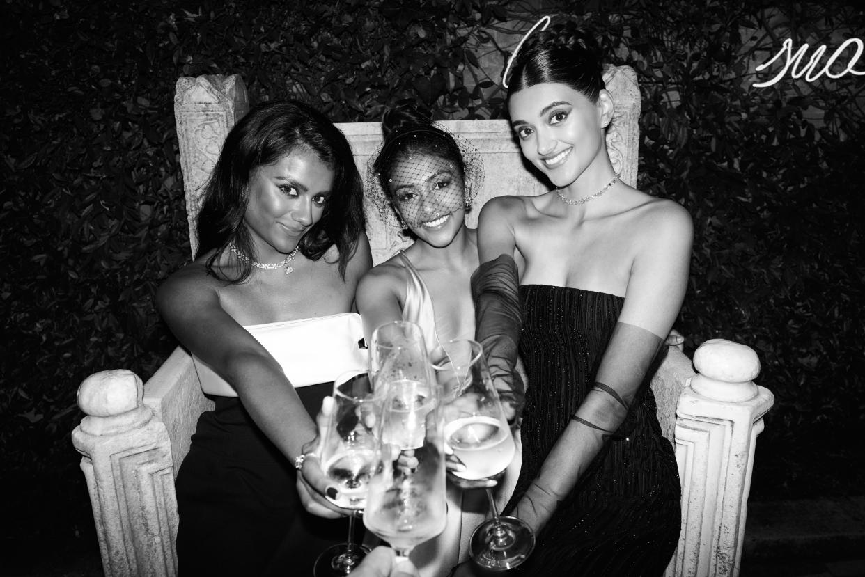 Charithra Chandran, Simone Ashley and Neelam Gill at the Armani Beauty dinner event during Venice Film Festival.