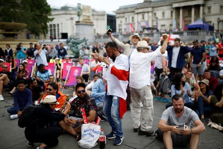 Cricket - Fans watch the ICC Cricket World Cup Final between New Zealand and England at Trafalgar Square