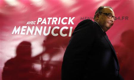 French Socialist Party deputy and candidate for the 2014 Marseille municipal elections Patrick Mennucci leaves after his speech for the results in the first round of local elections in Marseille March 23, 2014. REUTERS/Jean-Paul Pelissier