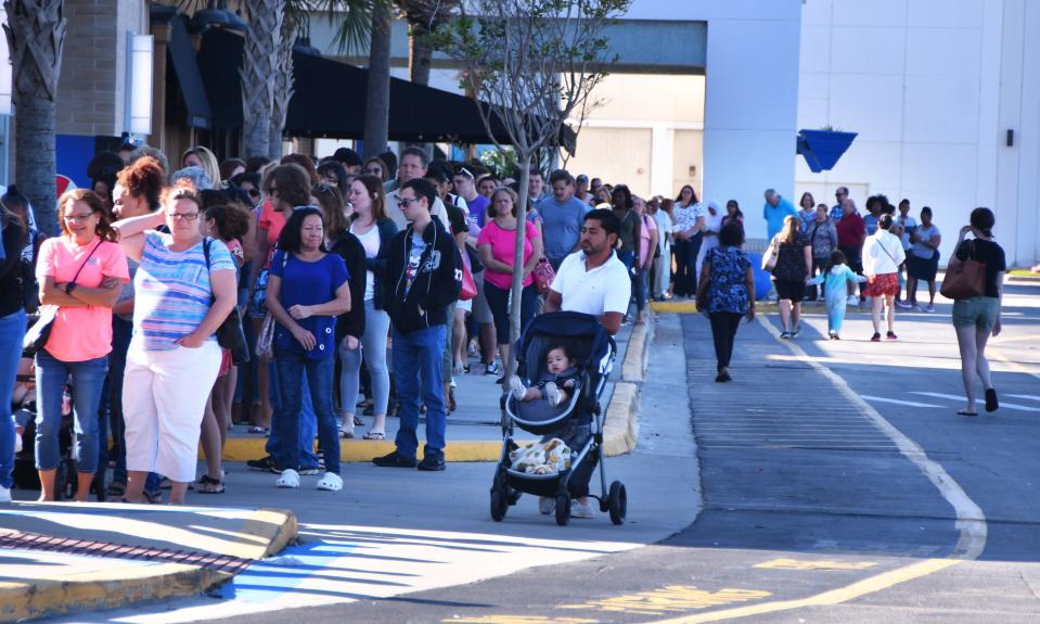 At a J.C. Penney in Merritt Island, Florida, shoppers started lining up before noon for a coupon giveaway. By the time the store opened at 2 p.m., hundreds had lined up.