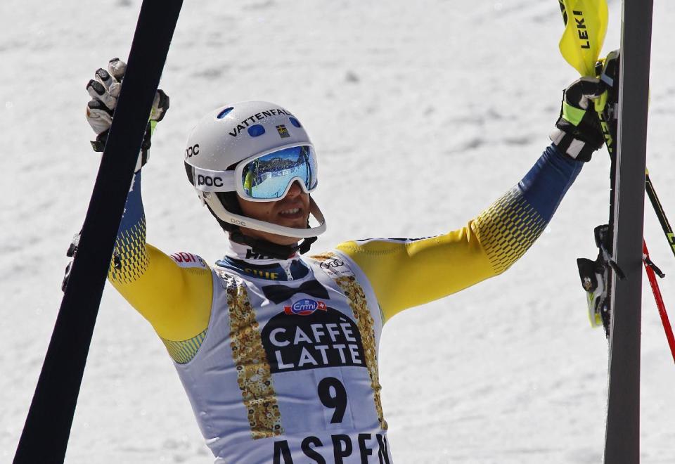 Sweden's Andre Myhrer celebrates after the second run of a men's World Cup slalom ski race Sunday, March 19, 2017, in Aspen, Colo. (AP Photo/Nathan Bilow)