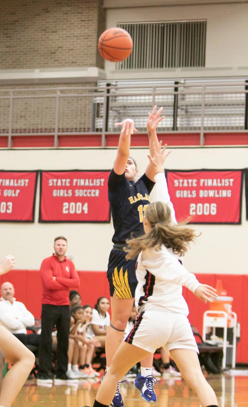 Liv Linden hits a 3-pointer to give Hartland a 39-33 lead in the third quarter of a 51-44 victory at Grand Blanc on Tuesday, Nov. 29, 2022.