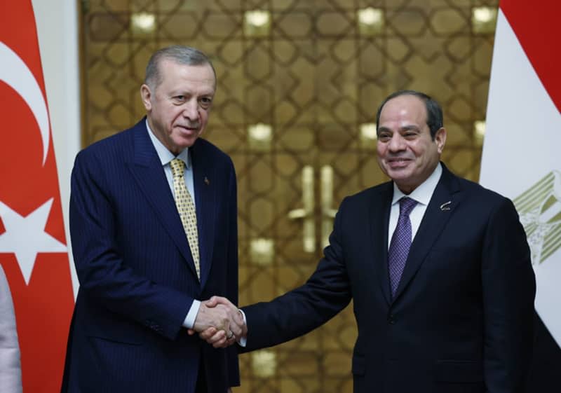 Presdient of Turkey Recep Tayyip Erdogan (L) shakes hands with President of Egypt Abdel Fattah al-Sisi ahead of a joint meeting. Erdogan arrived in Cairo on 14 February for talks with al-Sisi in a landmark visit that comes after around a decade of diplomatic strain between the two countries. -/Presidency of the Republic of Turkey/dpa
