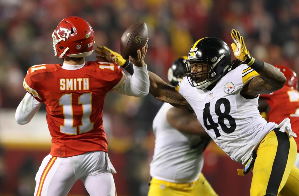 <p>Outside linebacker Bud Dupree #48 of the Pittsburgh Steelers attempts turnover block the pass attempt of quarterback Alex Smith #11 of the Kansas City Chiefs during the second quarter in the AFC Divisional Playoff game at Arrowhead Stadium on January 15, 2017 in Kansas City, Missouri. (Photo by Matthew Stockman/Getty Images) </p>