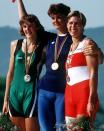 Canada's Silken Laumann (right) celebrates her bronze medal win with gold medal winner Elisabeta Lipa of Romania (centre) and silver medal winner Annelies Bredael (left) of Belgium in the 1x rowing event at the 1992 Olympic games in Barcelona. (CP PHOTO/ COC/F.S. Grant)