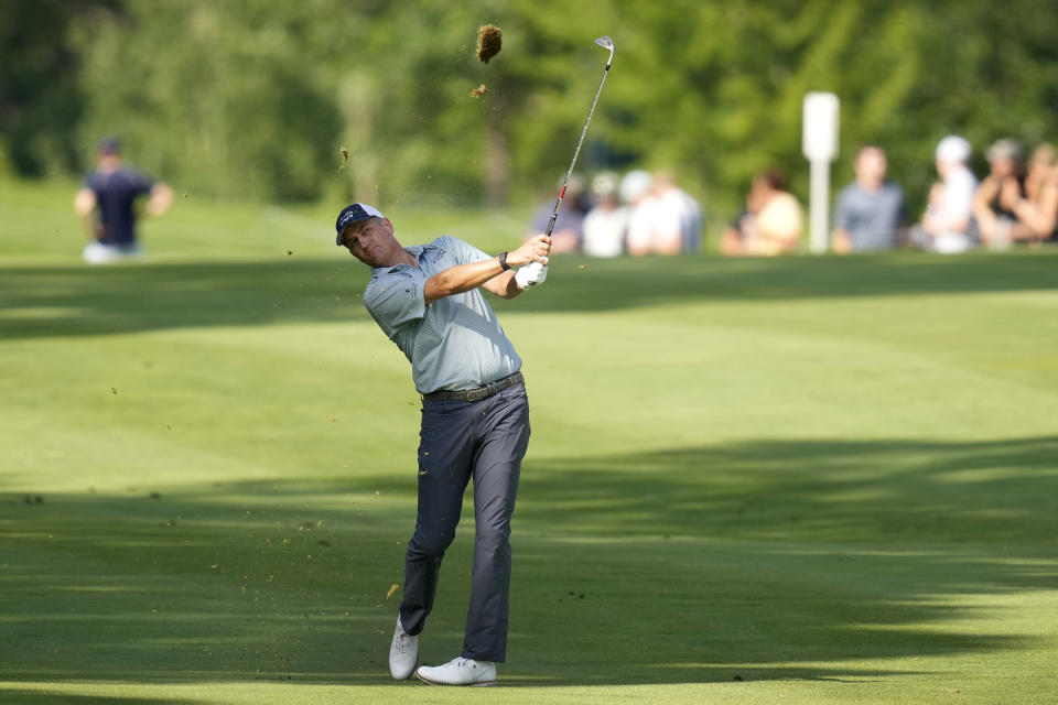 Brendon Todd watches his fairway shot on the 18th green during the third round of the John Deere Classic golf tournament, Saturday, July 8, 2023, at TPC Deere Run in Silvis, Ill. (AP Photo/Charlie Neibergall)