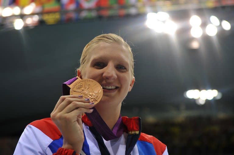 Rebecca Adlington with the Olympic women's 800m freestyle bronze medal she won in London last year. The popular Briton won two gold medals at the Beijing Games in 2008 but could only muster two bronze medals at London 2012 as the host nation's swimmers managed a disappointing three medals between them in the pool