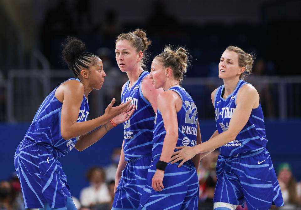 Chicago Sky's Candace Parker, Emma Meesseman, Courtney Vandersloot and Allie Quigley talk during a timeout against the Atlanta Dream on July 12, 2022, at Wintrust Arena in Chicago. (Melissa Tamez/Icon Sportswire via Getty Images)