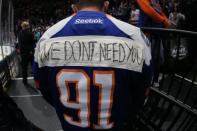 Feb 28, 2019; Brooklyn, NY, USA; A New York Islanders fan with a message for Toronto Maple Leafs center John Tavares (91) during the third period at the Nassau Veterans Memorial Coliseum. Mandatory Credit: Brad Penner-USA TODAY Sports