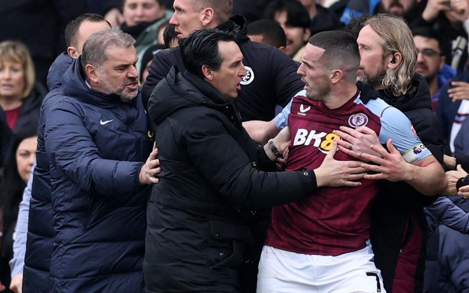 Aston Villa's John McGinn with manager Unai Emery and Tottenham Hotspur manager Ange Postecoglou before