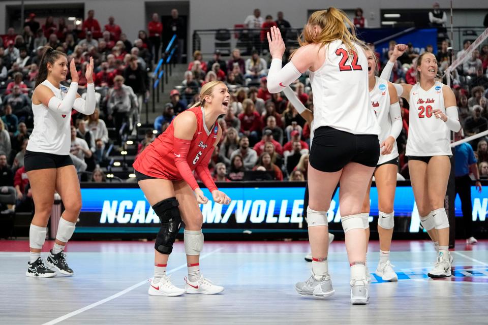 Dec 2, 2022; Columbus, Ohio, USA;  Ohio State Buckeyes Kylie Murr (6) celebrates a point with Emily Londot (22) during the NCAA women's volleyball tournament first round match against the Tennessee State Tigers at the Covelli Center. Mandatory Credit: Adam Cairns-The Columbus Dispatch
