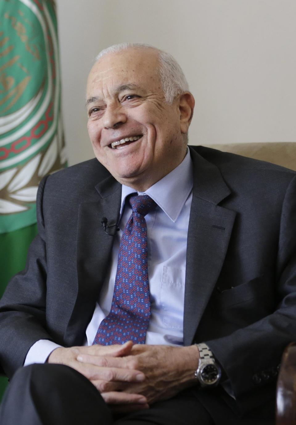 Arab League Secretary-General Nabil Elaraby smiles as listening to a question during an interview with the Associated Press, in Cairo, Egypt, Thursday, April 10, 2014. The head of the Arab League said Thursday he is confident that Israel and the Palestinians soon will resolve a crisis over the release of long-held Palestinian prisoners and extend their U.S.-brokered peace talks beyond an April deadline. Elaraby told The Associated Press that the April 29 deadline would be extended “for months” and rejected the idea that the talks have failed to make progress. (AP Photo/Hassan Ammar)