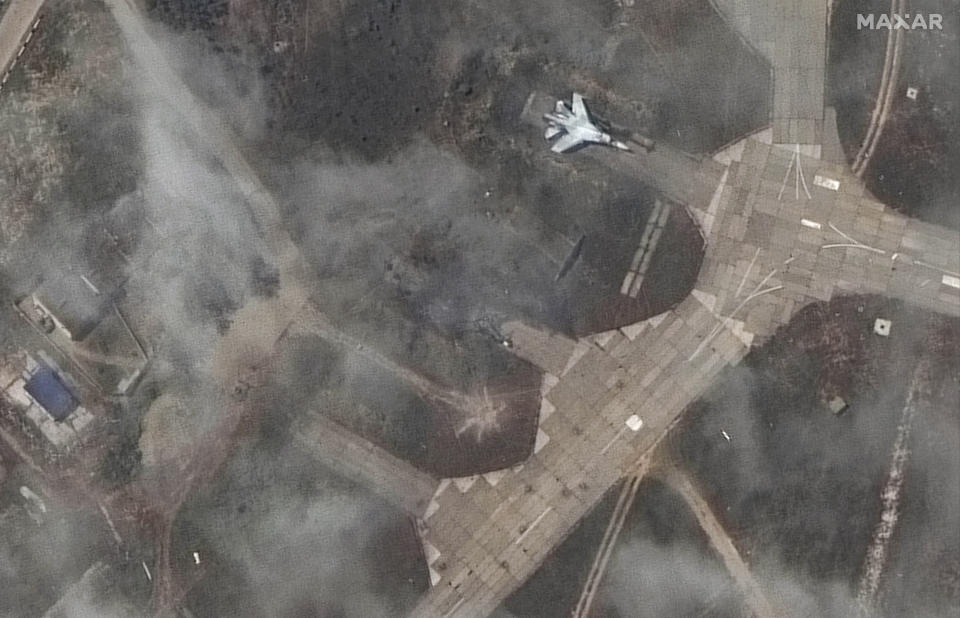 This image released by Maxar Technologies shows an overview of a destroyed SU 27 fighter aircraft in revetment at Belbek air base, near Sevastopol, in Crimea, Thursday, May 16, 2024. (Satellite image ©2024 Maxar Technologies via AP)