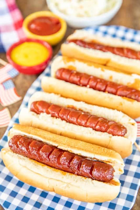 <p>Plain Chicken</p><p>No need to stop at the stadium for a great dog, your slow cooker has got you covered.<br></p><p><strong>Get the recipe: <a href="https://www.plainchicken.com/slow-cooker-bbq-hot-dogs/" rel="nofollow noopener" target="_blank" data-ylk="slk:Slow Cooker BBQ Hot Dogs;elm:context_link;itc:0;sec:content-canvas" class="link rapid-noclick-resp">Slow Cooker BBQ Hot Dogs</a></strong></p>