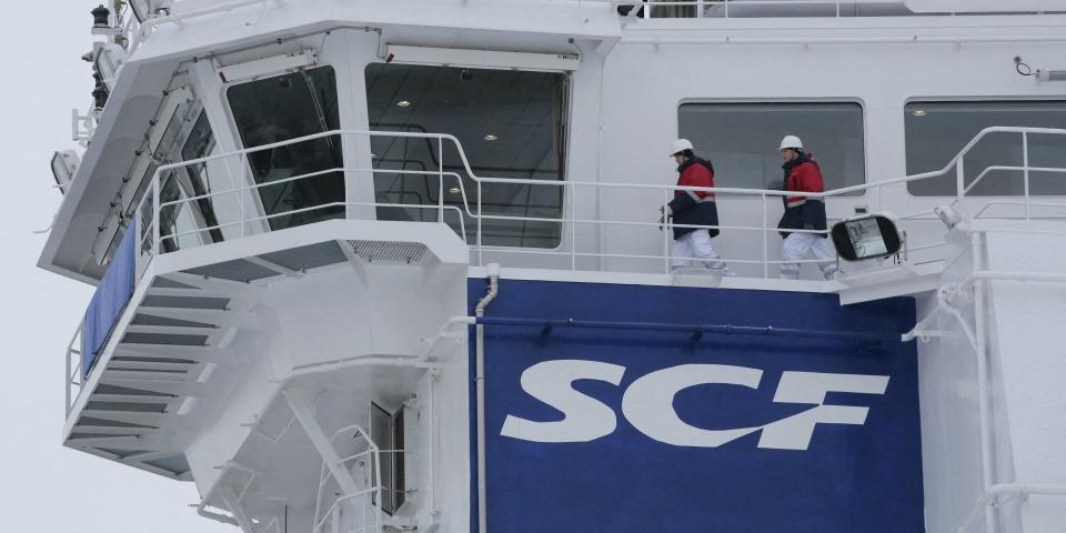 The logo of Russian state shipping company Sovcomflot is seen on the multifunctional icebreaking standby vessel "Yevgeny Primakov" moored in central St. Petersburg