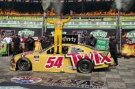 Kyle Busch celebrates in Victory Lane after winning a NASCAR Xfinity Series auto race at Texas Motor Speedway in Fort Worth, Texas, Saturday, June 12, 2021. (AP Photo/Tony Gutierrez)