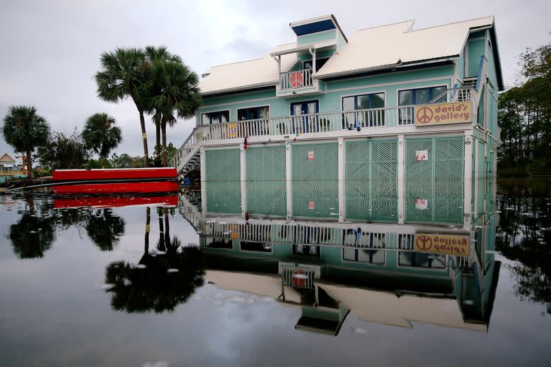 FILE PHOTO: A house surrounded by flood waters is pictured after Hurricane Sally in Gulf Shores