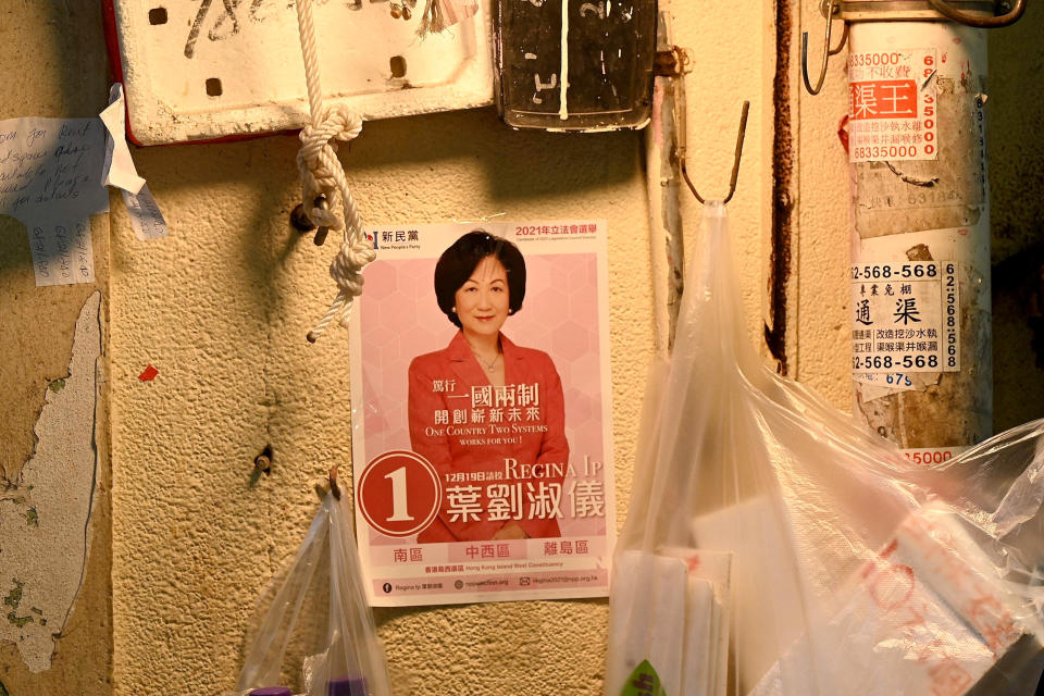 Image: A campaign poster at a market in Hong Kong before the city's legislative elections (Peter Parks / AFP - Getty Images)