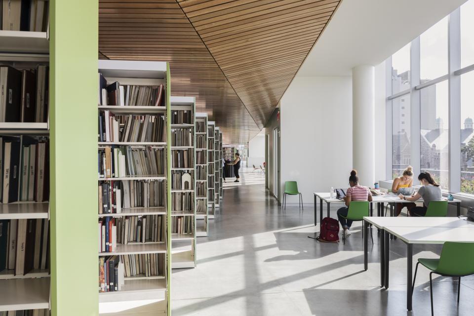 Though many of its books are stored in a new automated system, the Charles Library maintains a collection of 200,000 in bright green shelves on its light-filled fourth floor.
