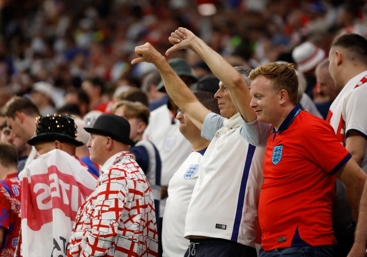 England fans react to their draw with USA (Reuters)