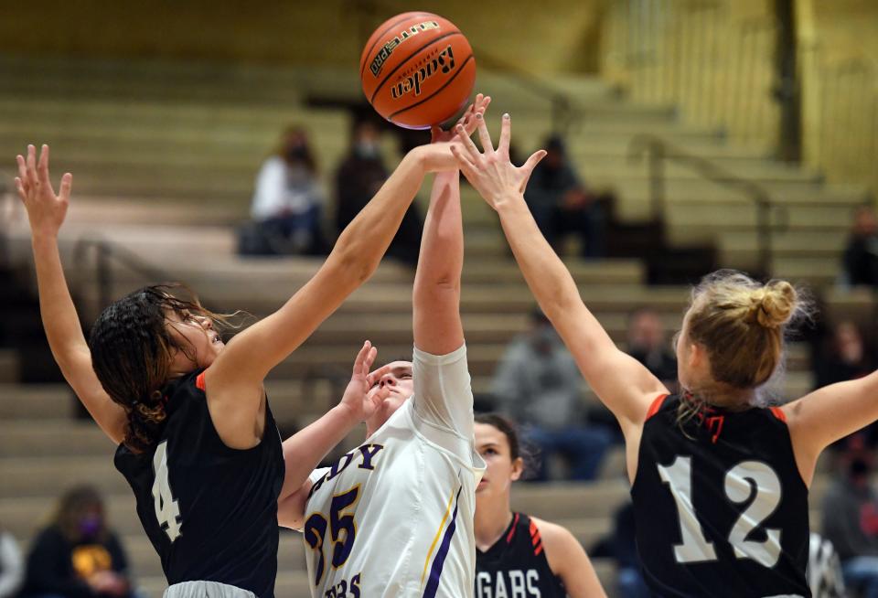 A shot by White River's Kelsey Morrison is nearly blocked by Viborg-Hurley's Nevaeh Ronke and Coral Mason on Friday, Feb. 12, at the Corn Palace in Mitchell, SD.