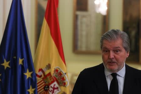 FILE PHOTO - Spain's Government spokesman, Inigo Mendez de Vigo, speaks during an interview with Reuters at Education Ministry in Madrid, Spain, October 28, 2017. REUTERS/Sergio Perez