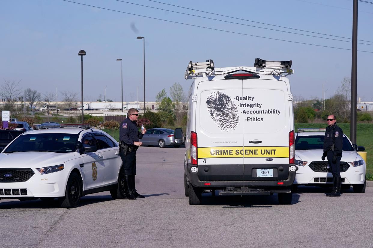 A crime scene vehicle arives where multiple people were shot at the FedEx Ground facility early Friday morning, April 16, 2021, in Indianapolis.